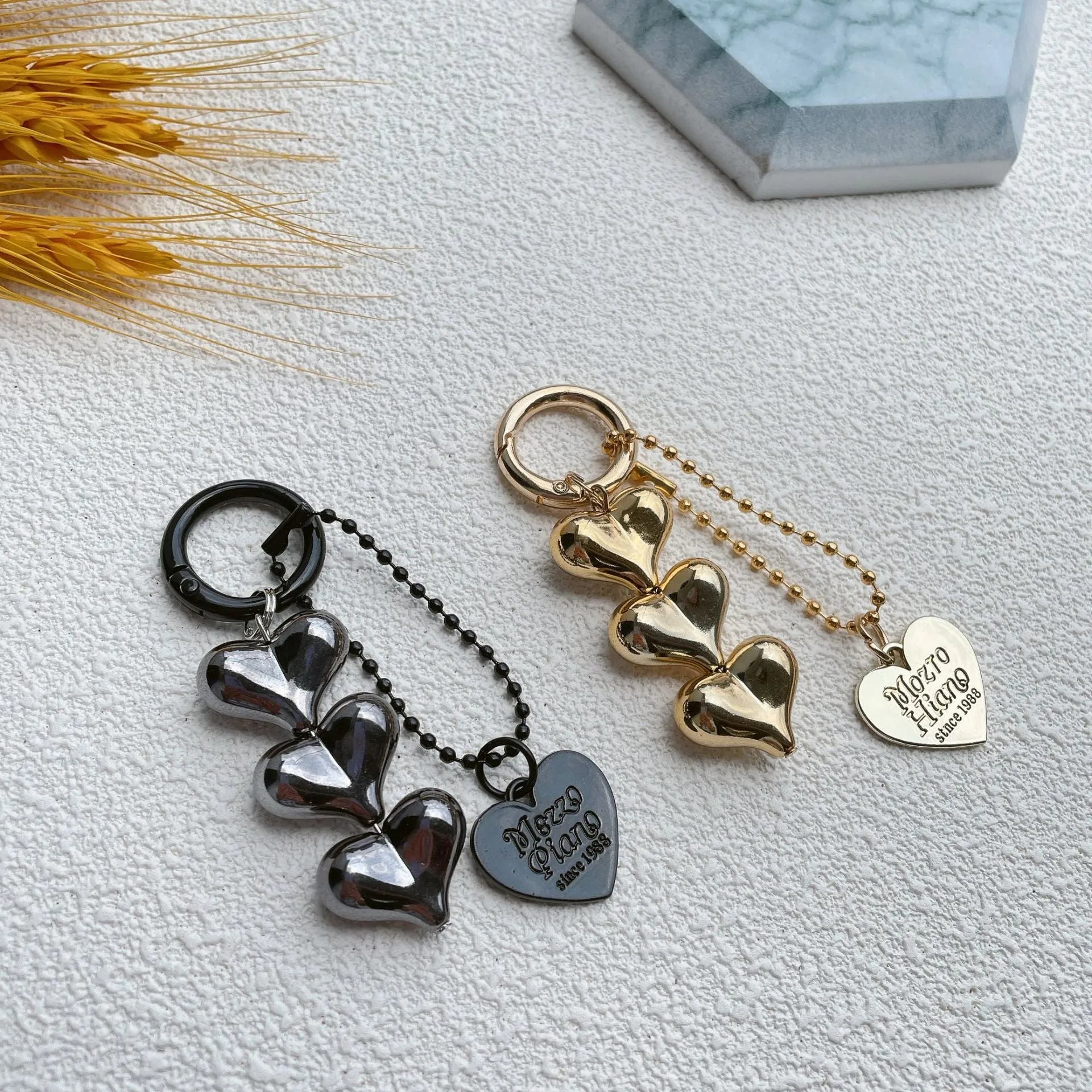 Acrylic Love Heart key ring with electroplated finish in metallic gold colour on a keychain