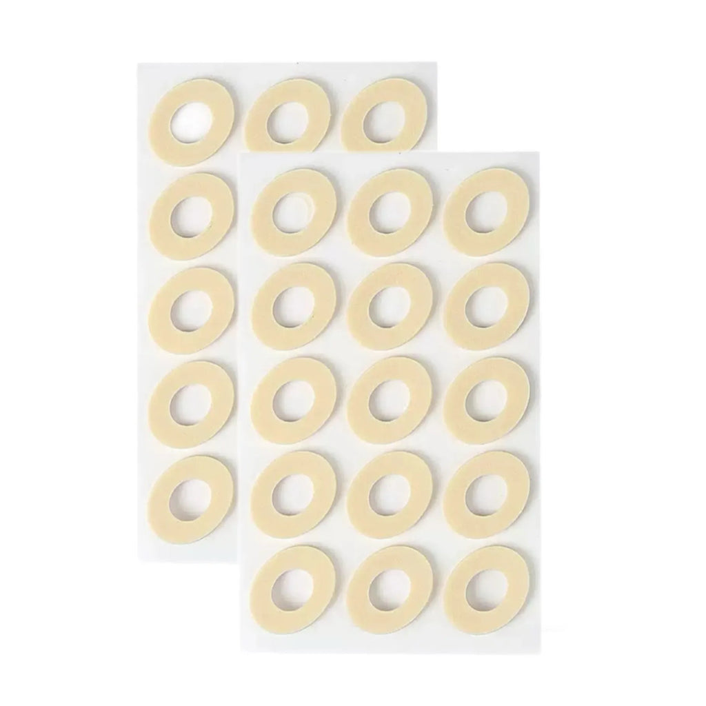 Set of women's heel grips showing four shapes: large oval, small oval, U-shaped, and circular section