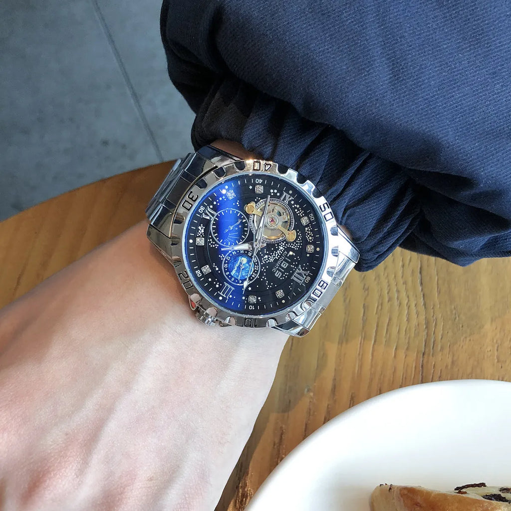 Men's silver case automatic watch with black starry dial and leather strap