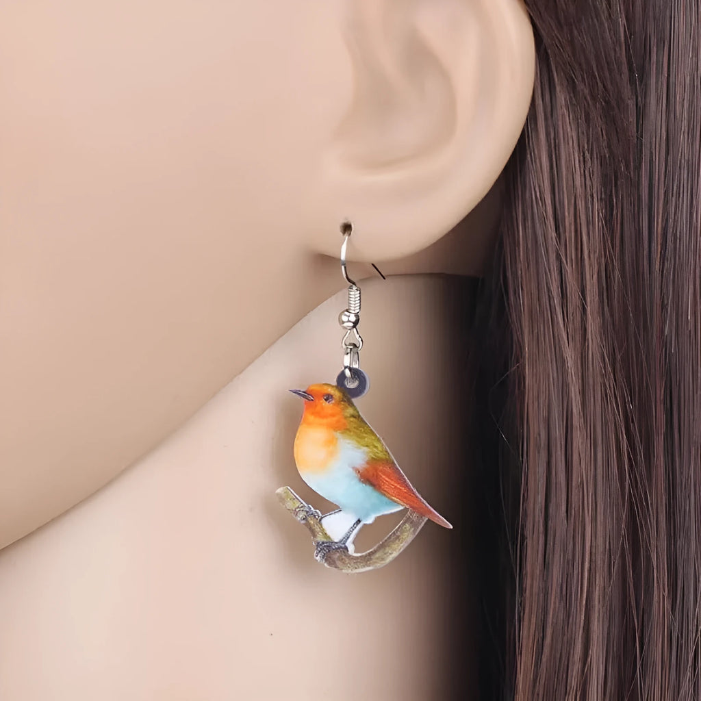 Blue titmouse pendant earrings made from acrylic with geometric animal design