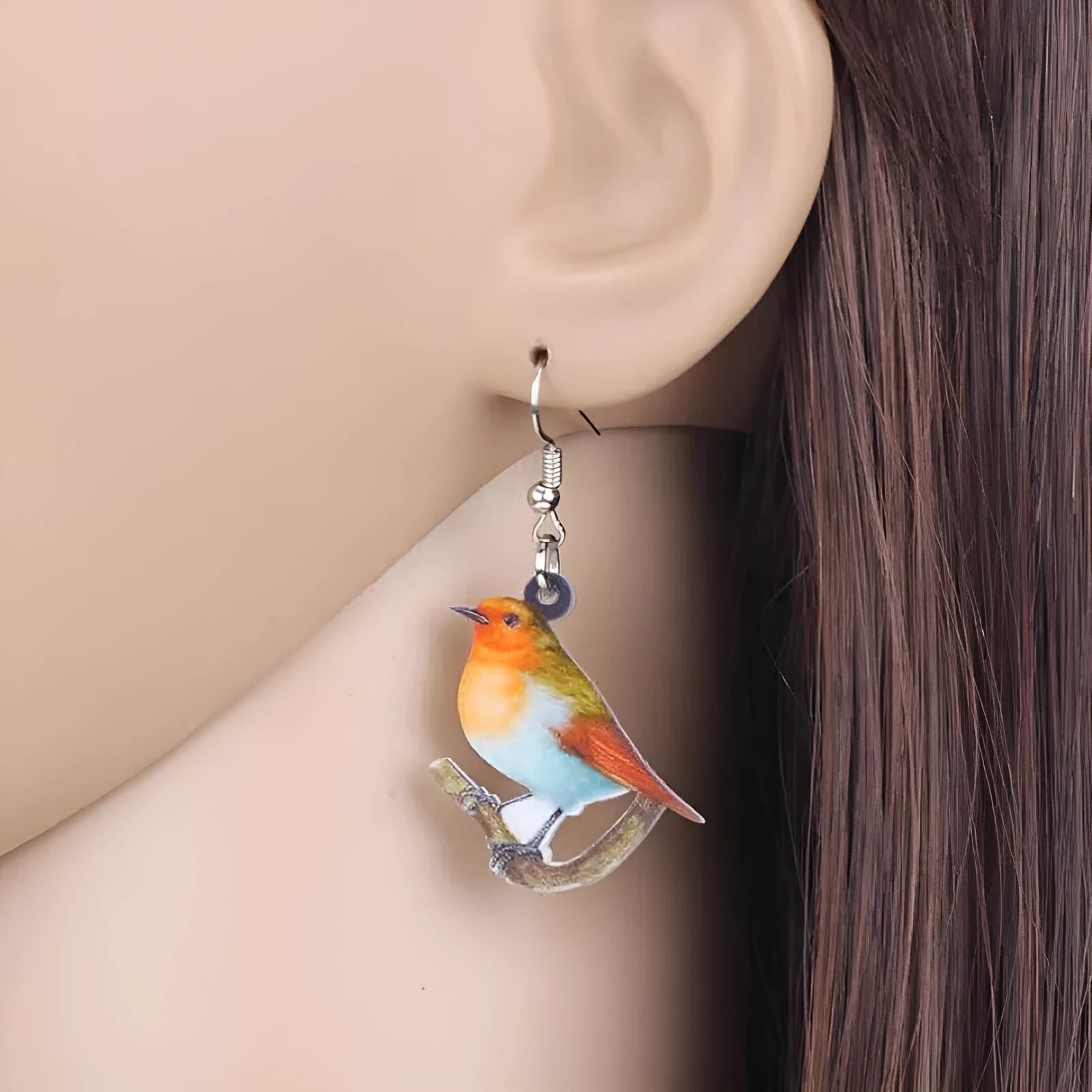 Blue titmouse pendant earrings made from acrylic with geometric animal design