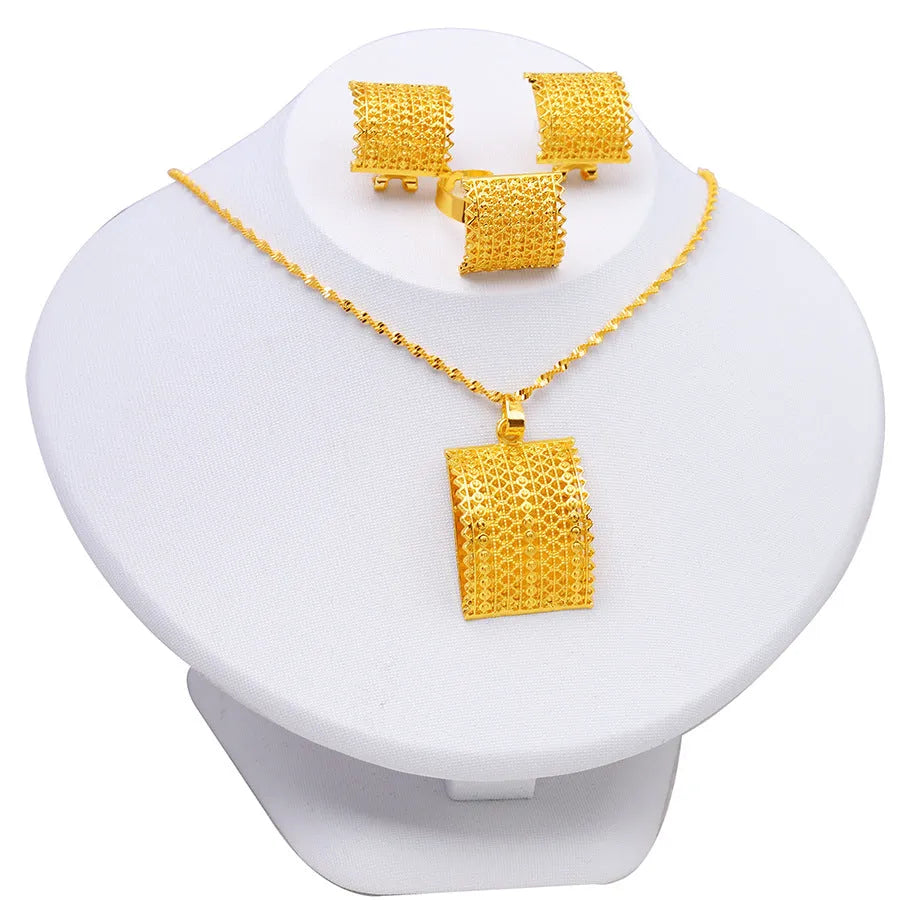 Women's bridal wedding gold jewelry set including copper necklace, earrings, and ring in natural style golden finish