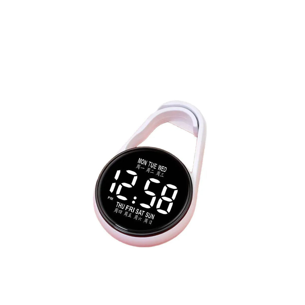 Mini digital electronic watch with luminous week display on a plastic strap, shown in multiple colour options.