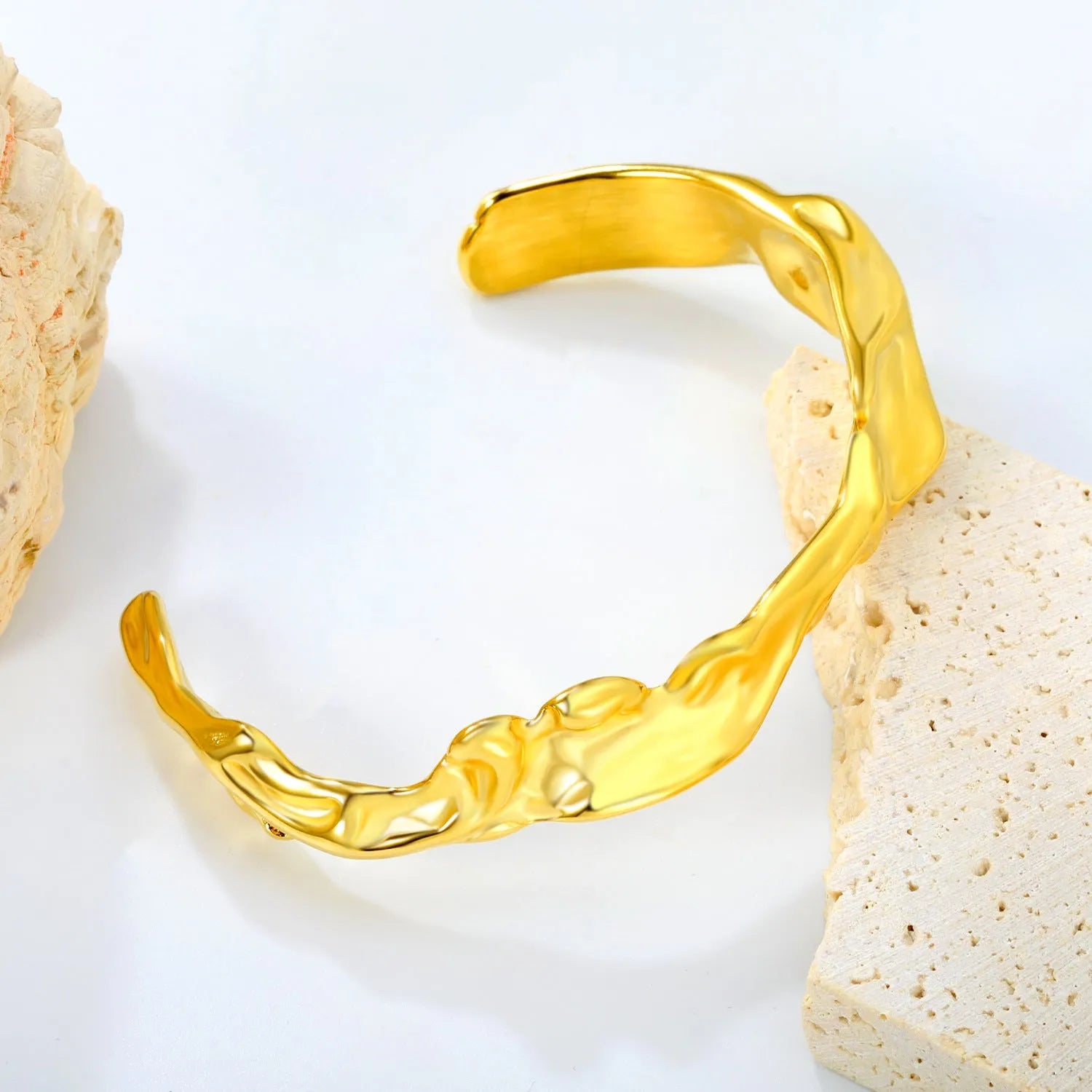 Contemporary stainless steel and alloy bracelet in European-American style on a wrist.