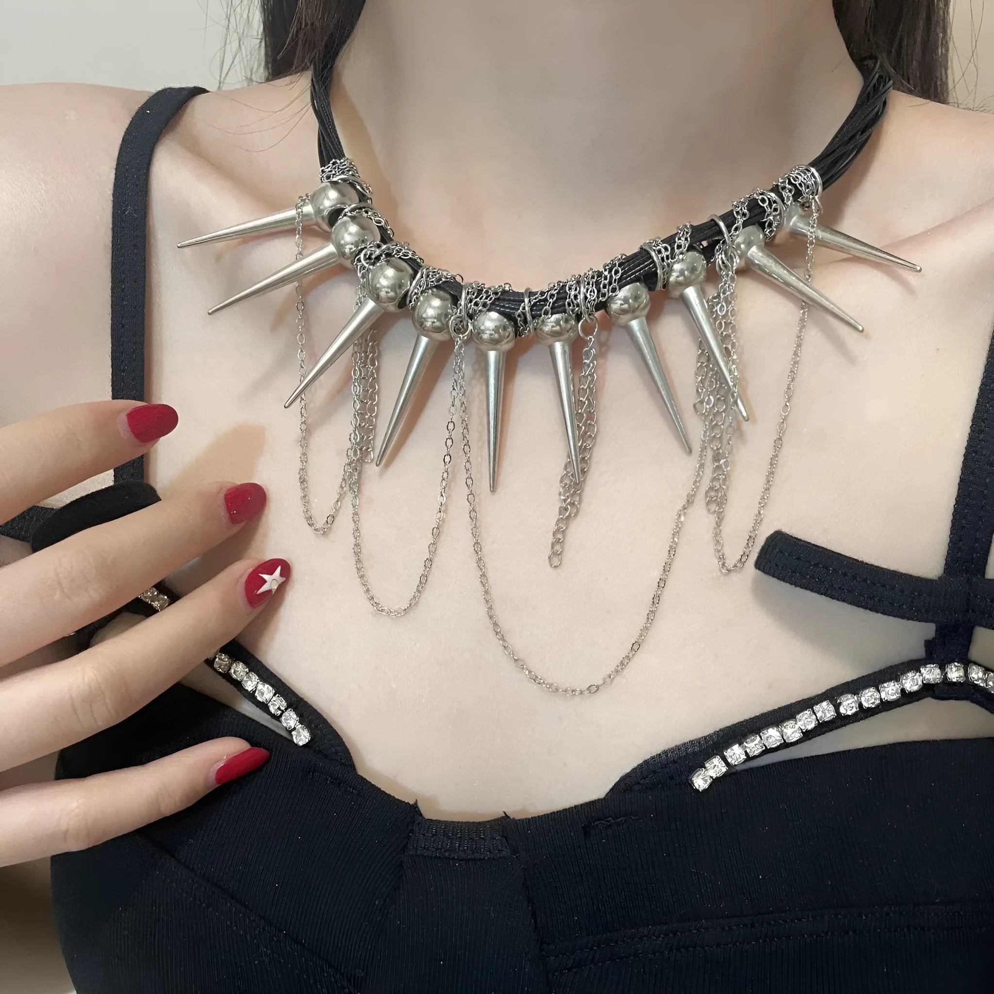 Leather necklace with round beads, winding tassel, and point rivet details in casual style