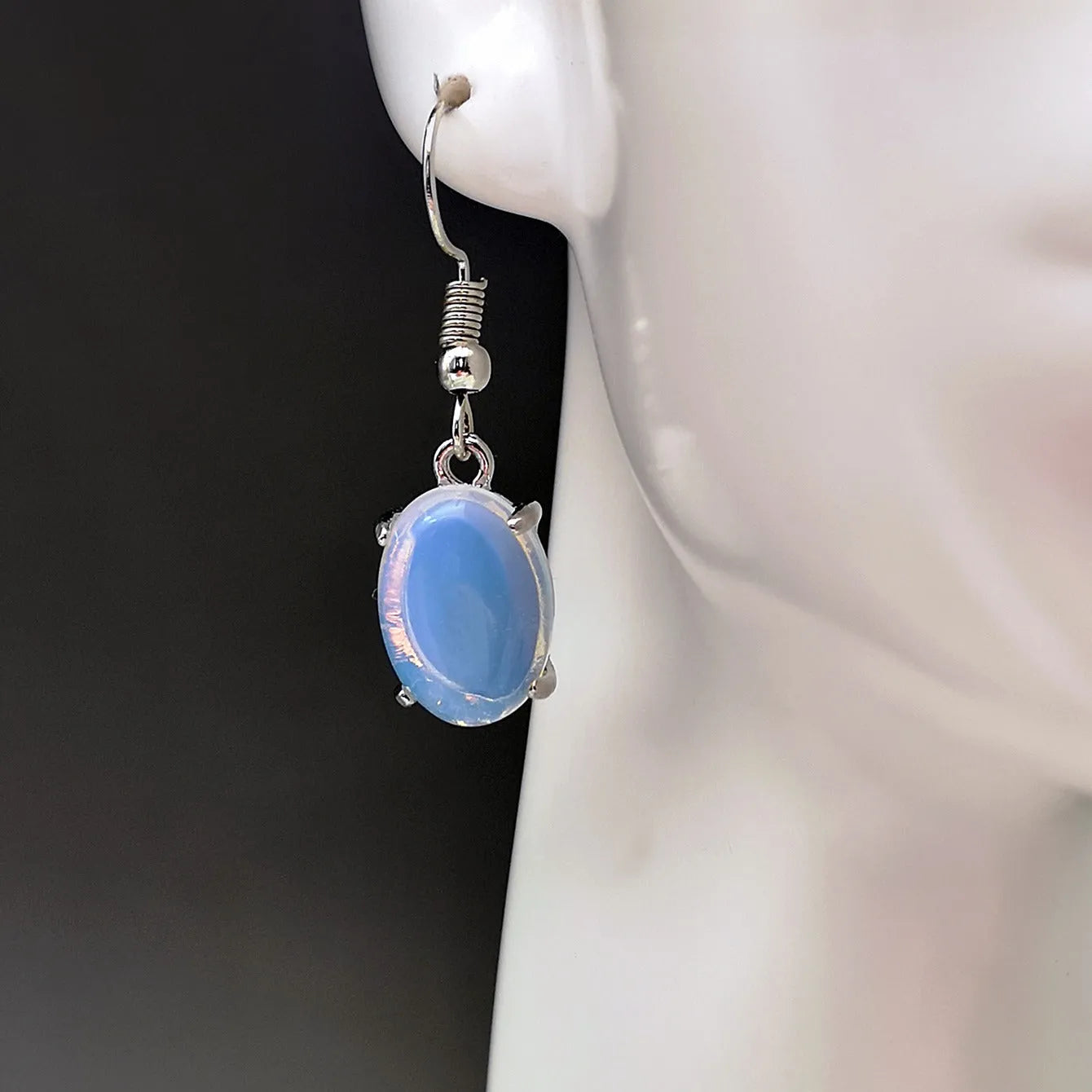 Moonlight white opal earrings with retro moonstone cross design and drop shape
