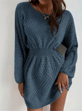 Blue women's knitted dress with hand-crocheted flowers, round neck, fitted waist, and long sleeves