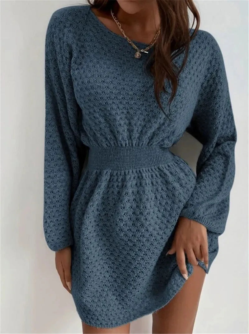 Blue women's knitted dress with hand-crocheted flowers, round neck, fitted waist, and long sleeves