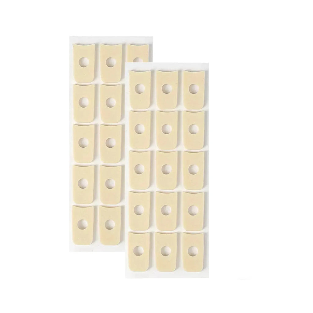 Set of women's heel grips showing four shapes: large oval, small oval, U-shaped, and circular section