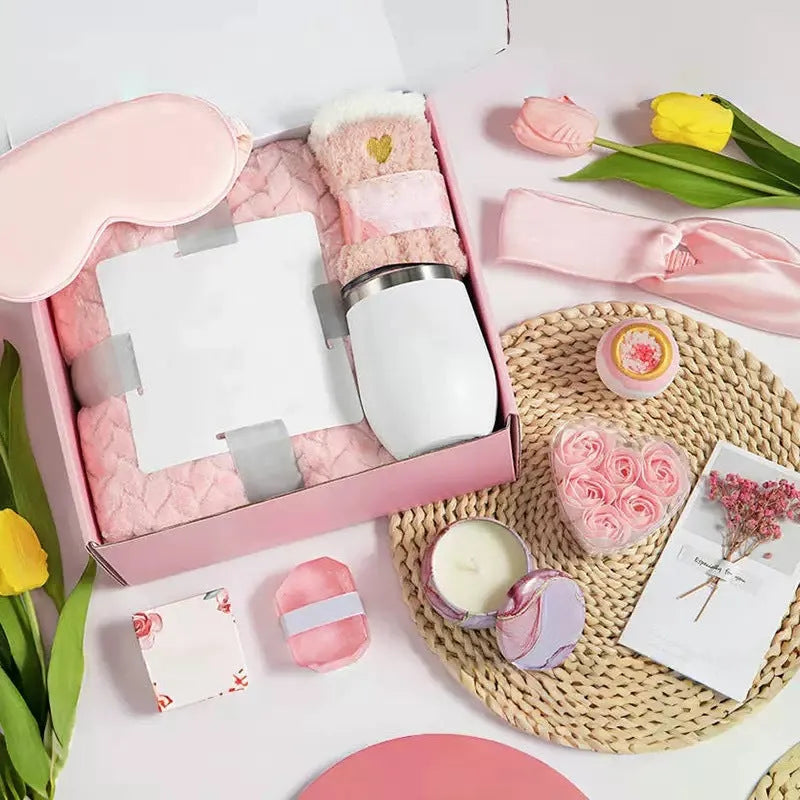 Aromatherapy gift box containing soy wax candles and bath products in modern simplicity design.