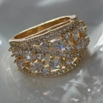 Women's round hollow fashion ring in copper with gemstone options, showing the openwork design.