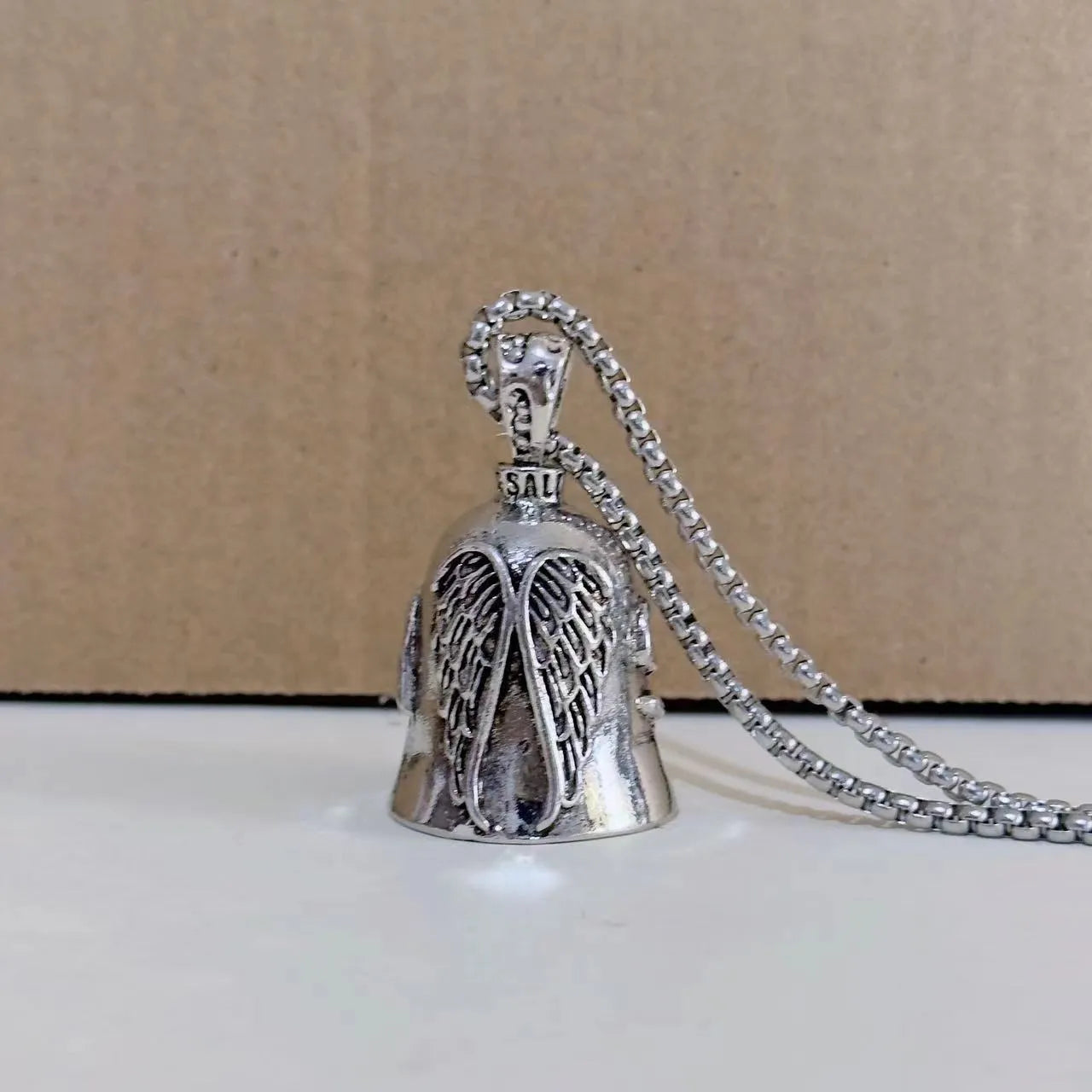 Vintage white angel feather necklace and matching keychain with wing pendant design