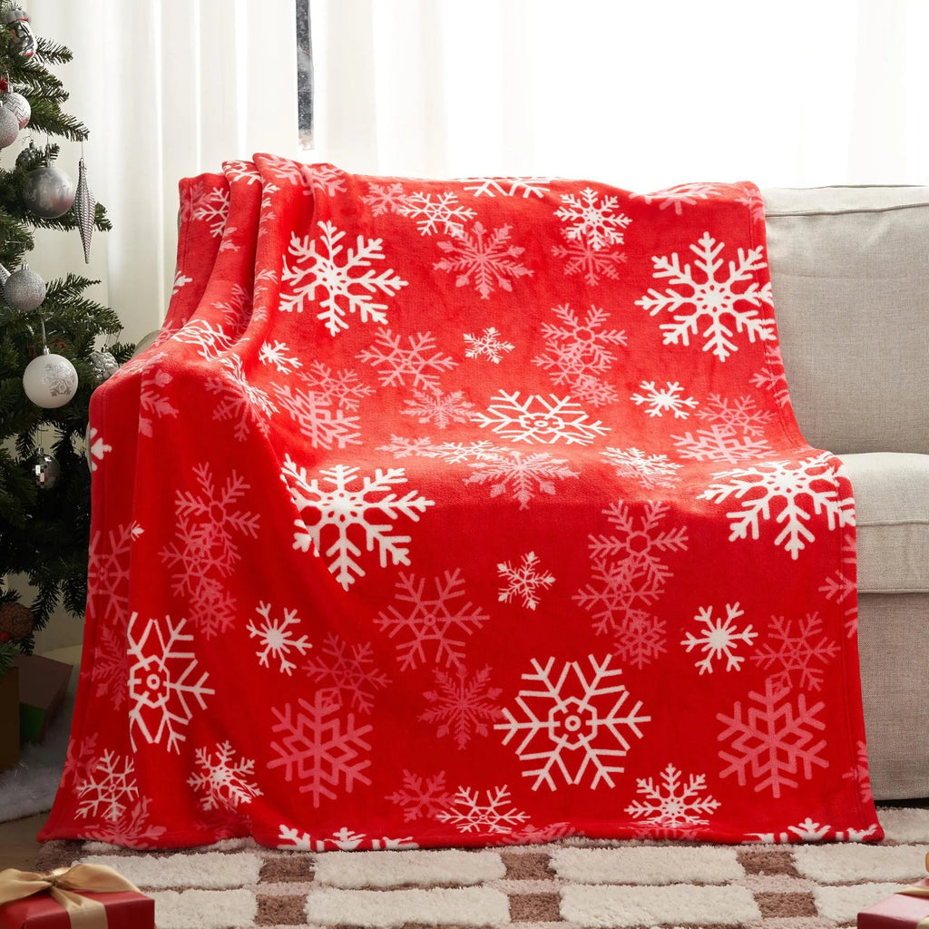 American style soft plush flannel Christmas blanket in a choice of five colours, showing its texture.