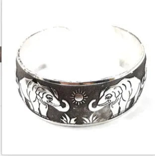 Ethnic carved open bracelet with Miao silver-style design in elephant colour
