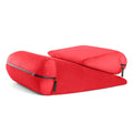 High-density sponge triangle furniture pad pillow in five colours on a grey sofa.