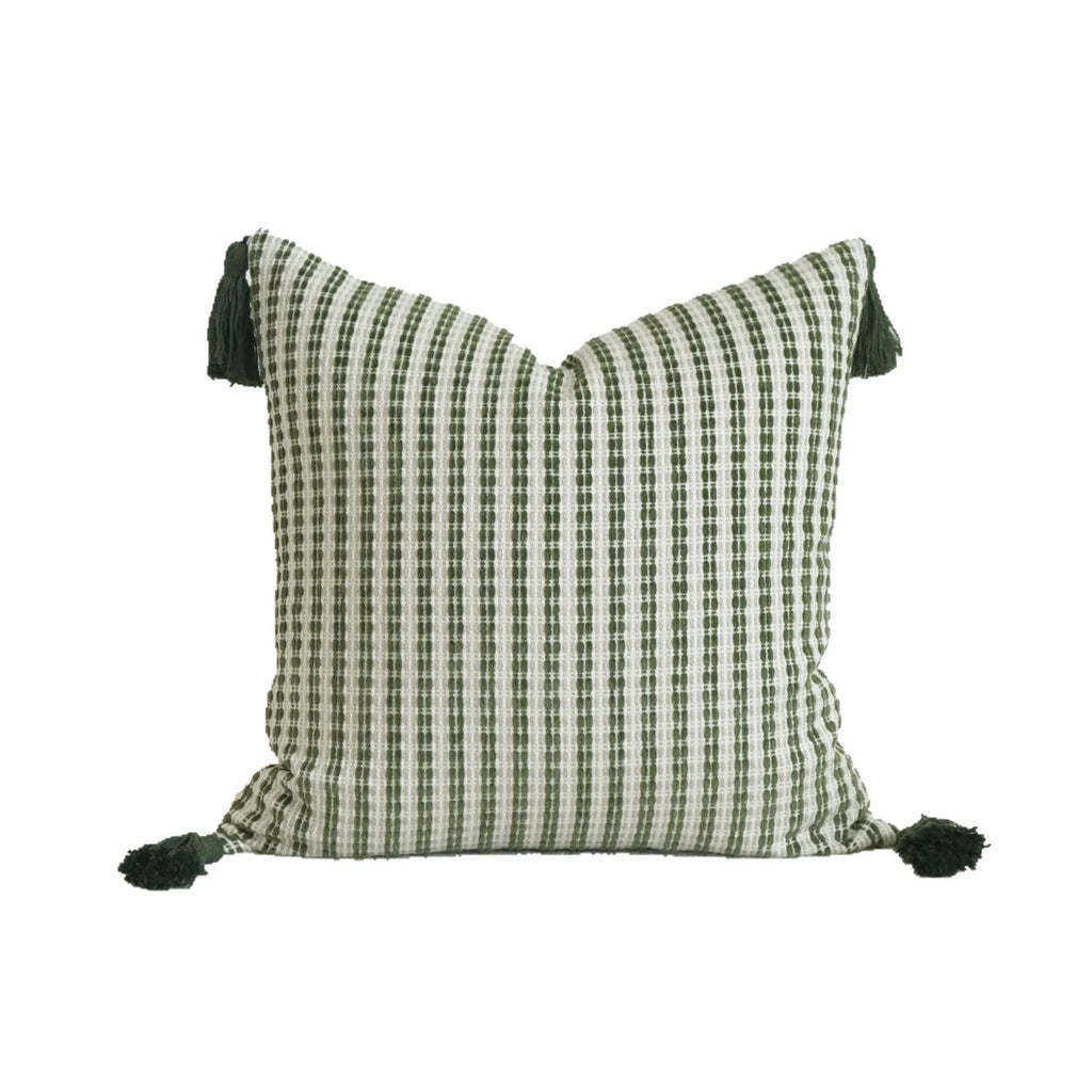 Green cotton and linen hotel sample pillow with botanical pattern and tassel trim, shown with separate pillow core.