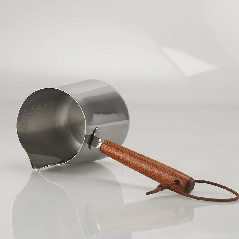 Stainless steel coffee cup with wooden handle, garland design, in modern simple style.