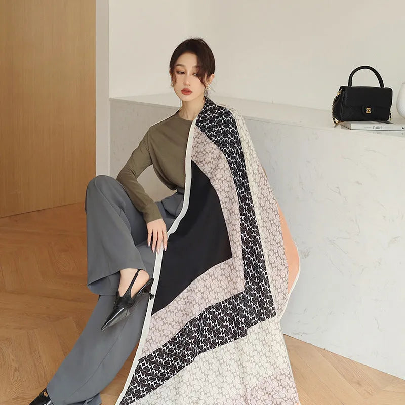 Women's printed polyester scarf showing 180cm length and 90cm width dimensions with autumn-appropriate design
