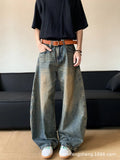 Men's retro blue distressed denim trousers with wide leg cut and vintage wash detailing