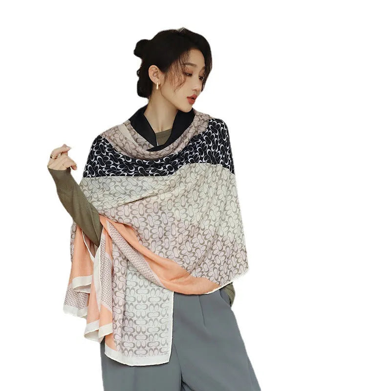Women's printed polyester scarf showing 180cm length and 90cm width dimensions with autumn-appropriate design