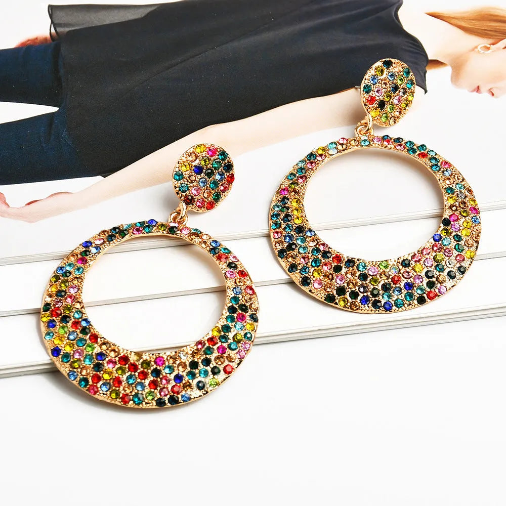 Colourful cartoon style metal earrings with round diamond shapes and large pendant design