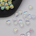 20 translucent heart-shaped acrylic spacer beads in assorted colours for jewellery making