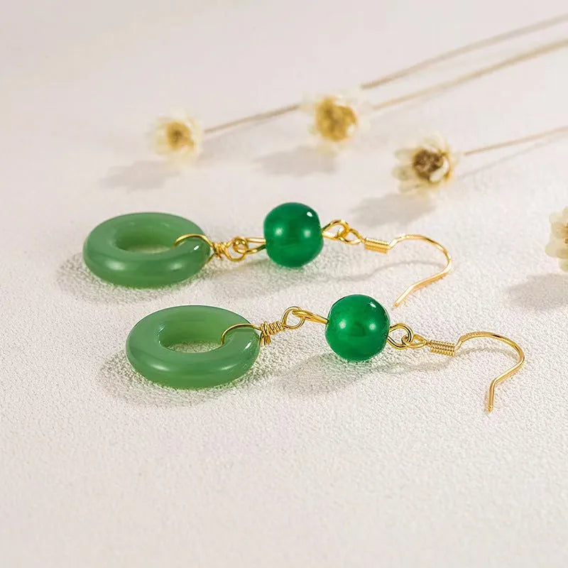 Green zinc alloy earrings with Chinese peace buckle design and geometric pattern