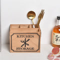 Open wooden kitchen storage box with internal grid holding knives, forks, and chopsticks.