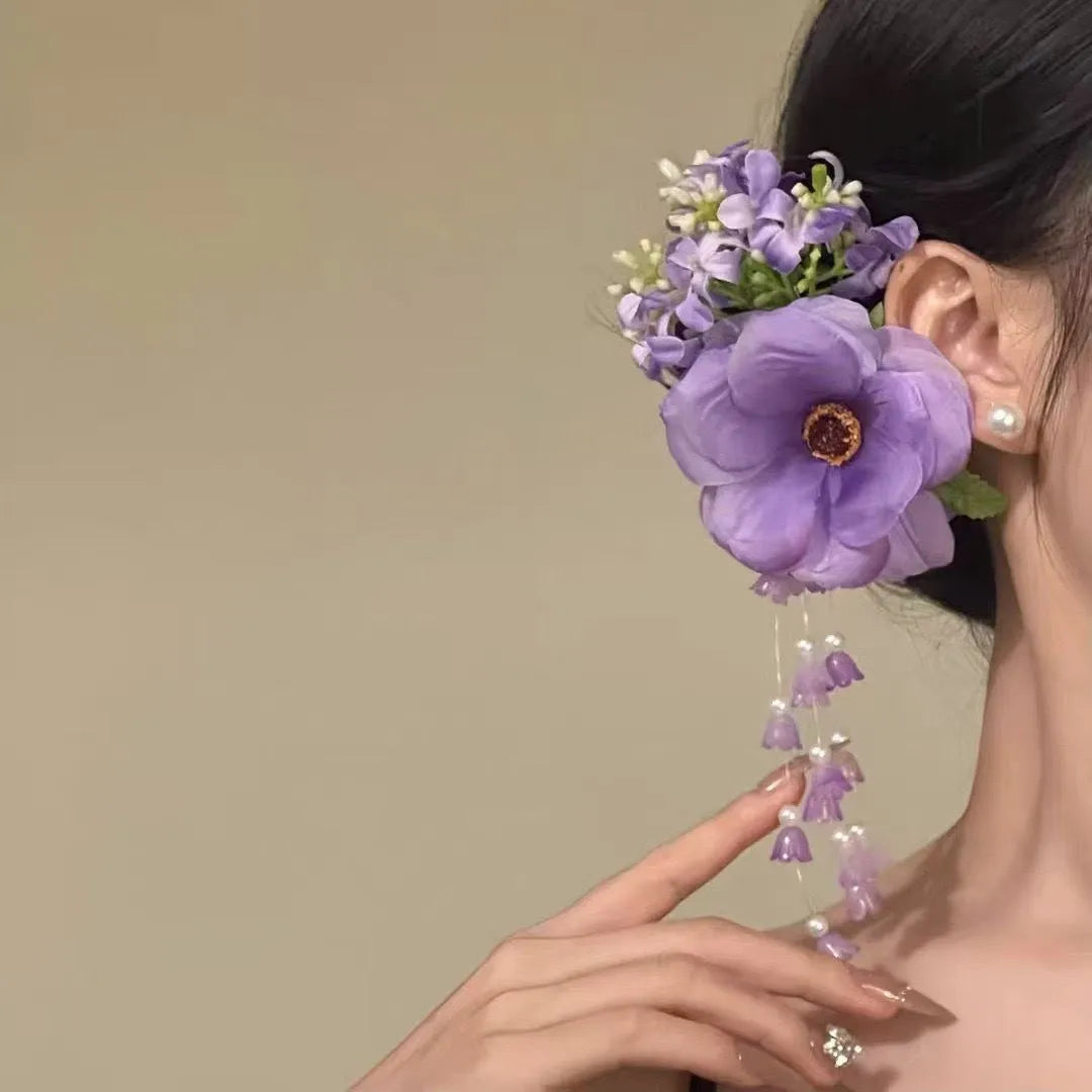 Yellow and purple floral tassel side hair clip for women on holiday style.