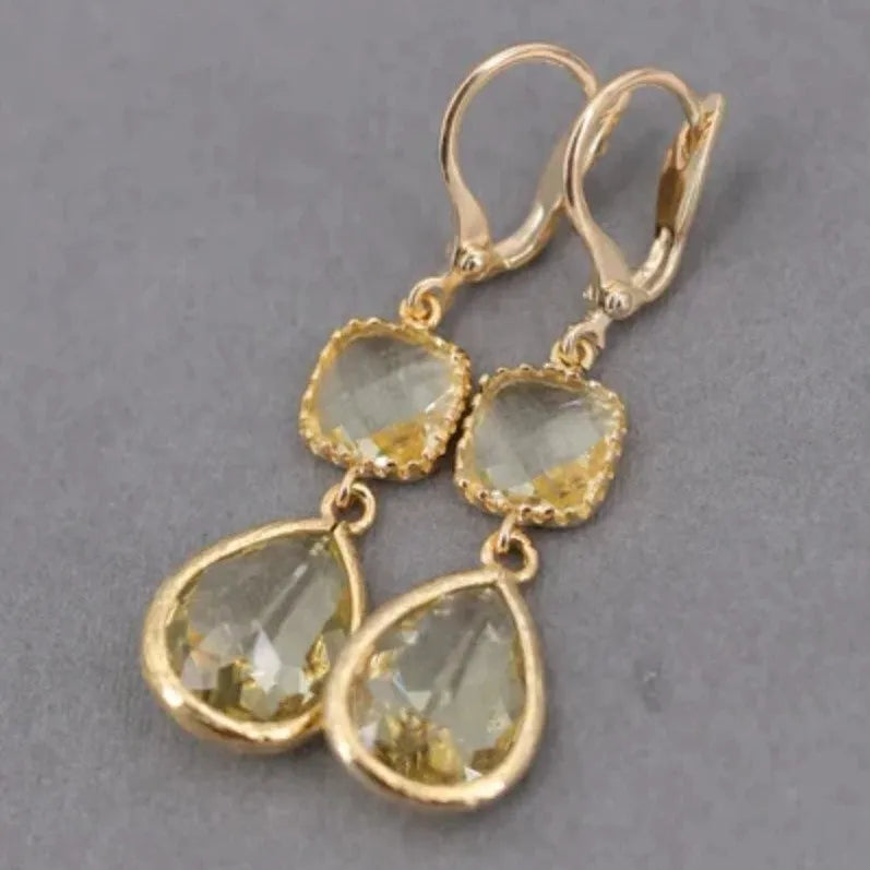 Gold geometric fringe earrings with crystal water droplets on copper frame