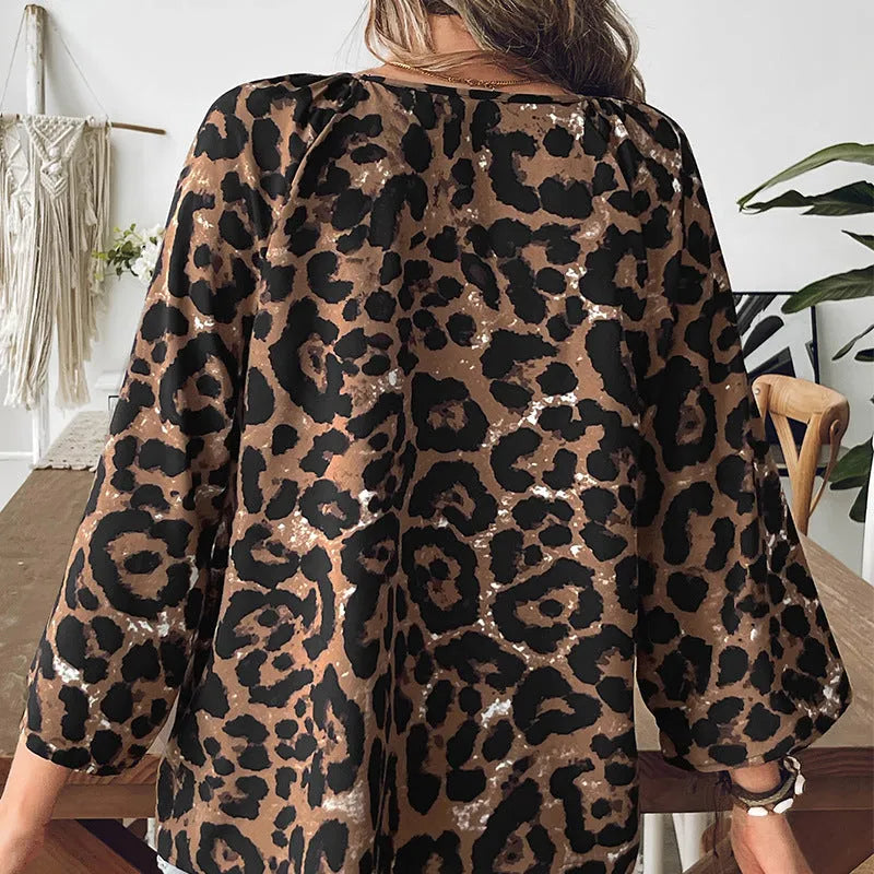 Women's leopard print V-neck half sleeve pullover top with pleated detailing