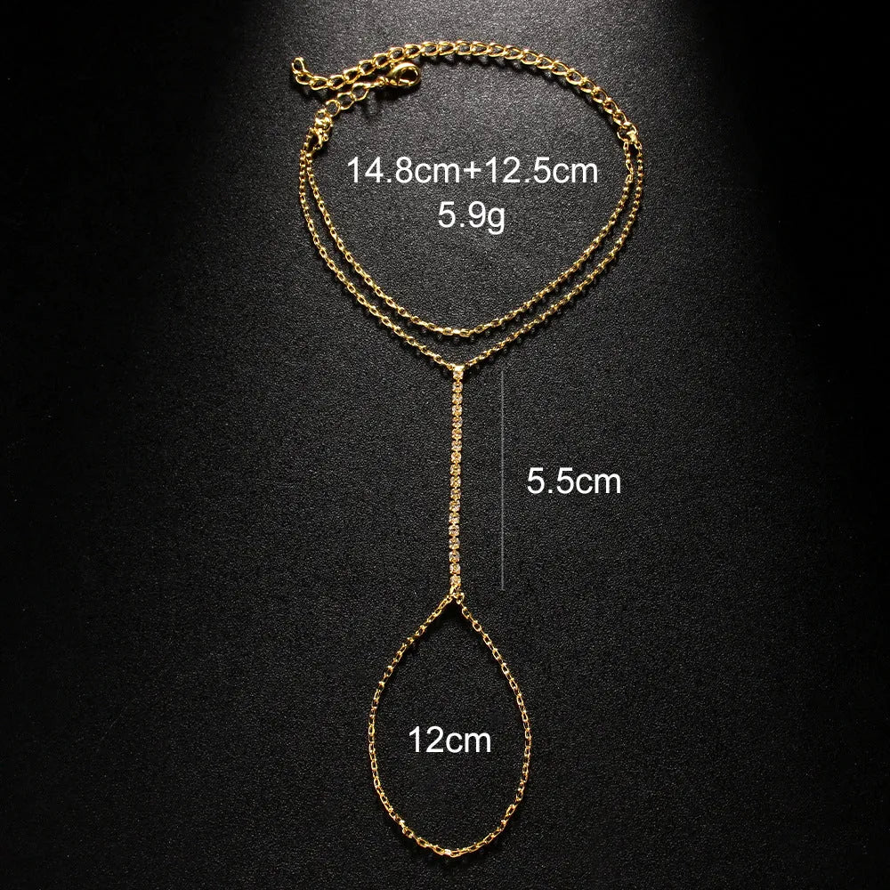 Women's geometric alloy bracelet with rhinestones in silver or gold colour.