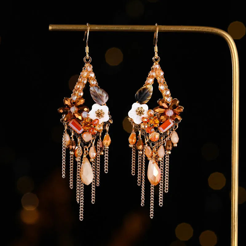 Retro bohemian hand-woven long drop earrings with artificial crystal diamond shape in amethyst colour