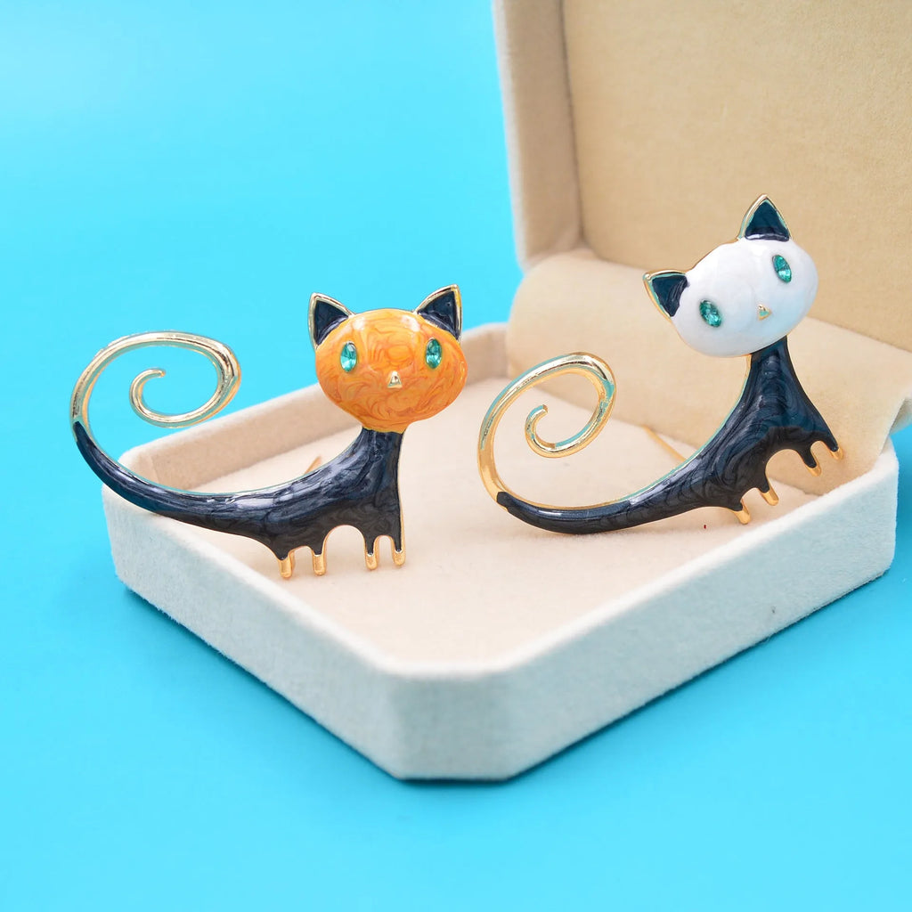 Personalised painted cat brooch in alloy metal showing white and orange colour options