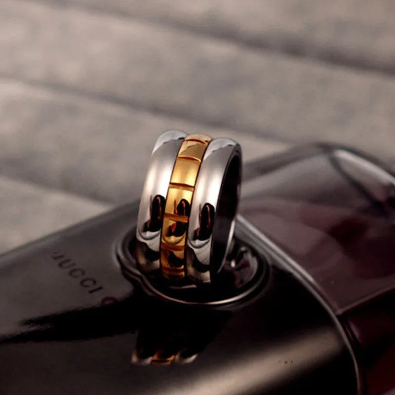 Gold titanium steel rotatable knuckle ring on finger, natural style, 17mm diameter, electroplated finish