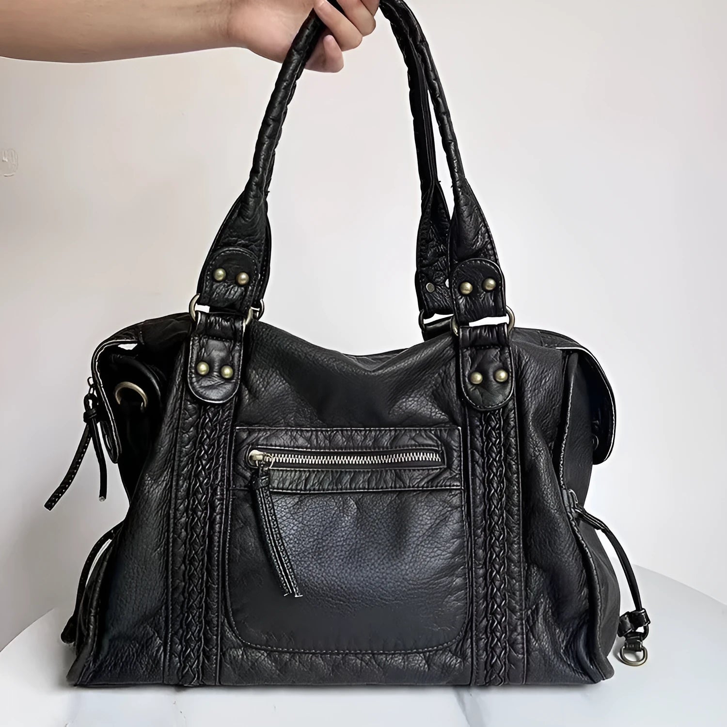 French retro women's motorcycle messenger bag in brown with weaving pattern detail and single shoulder strap