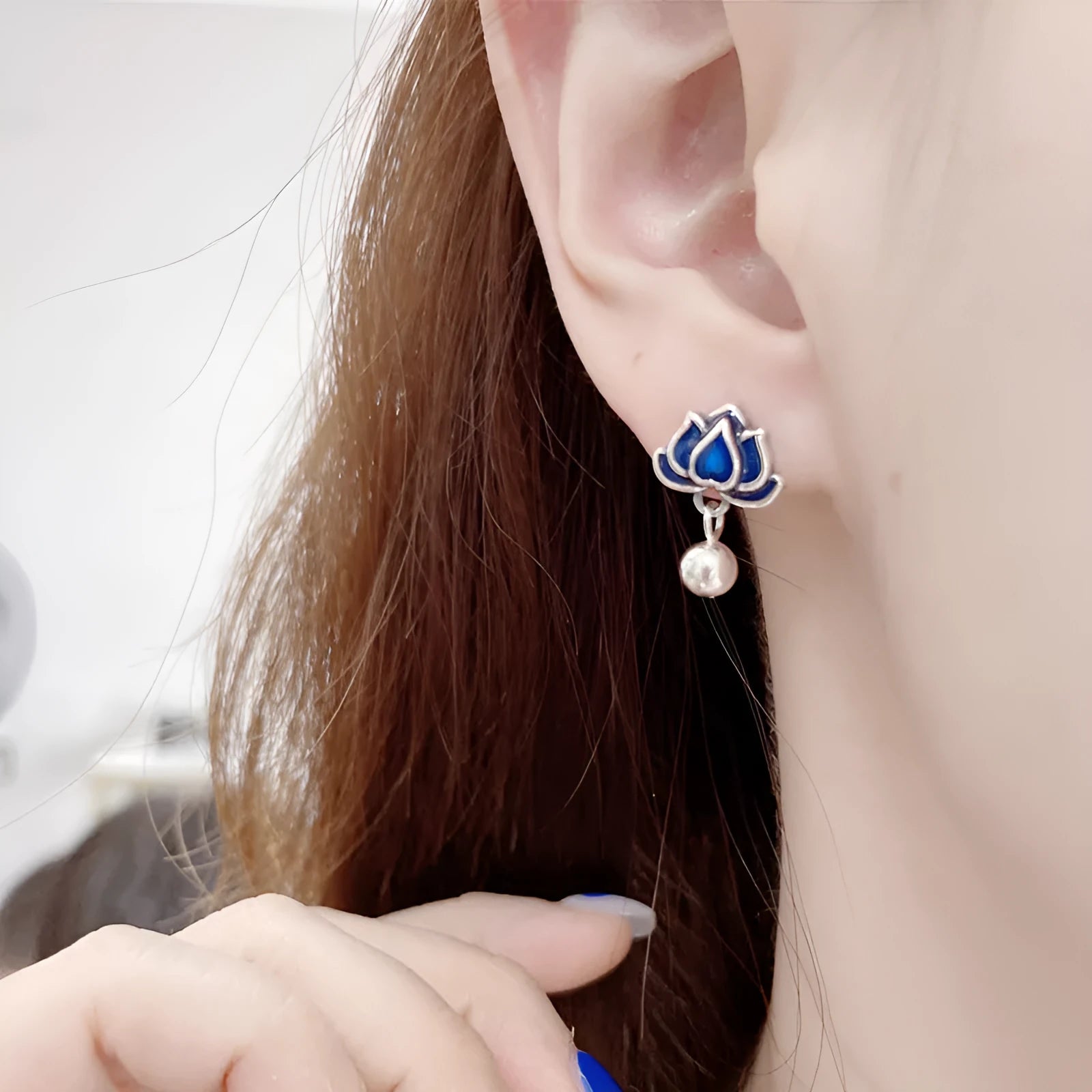 Women's lotus seedpod earrings with tassel accents in silver needle alloy