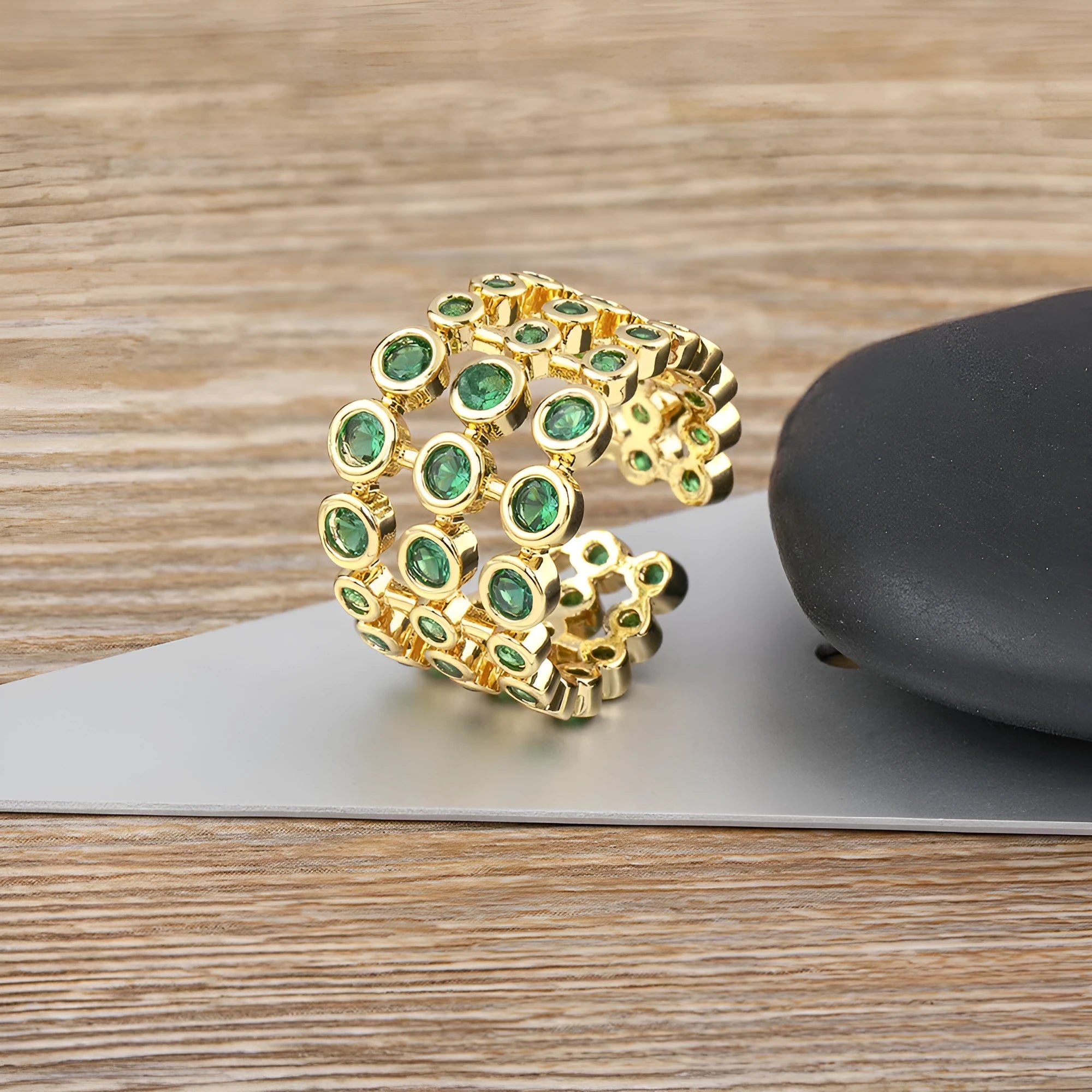 Copper ring with 18K gold plating and green zircon stones in wide band unisex design