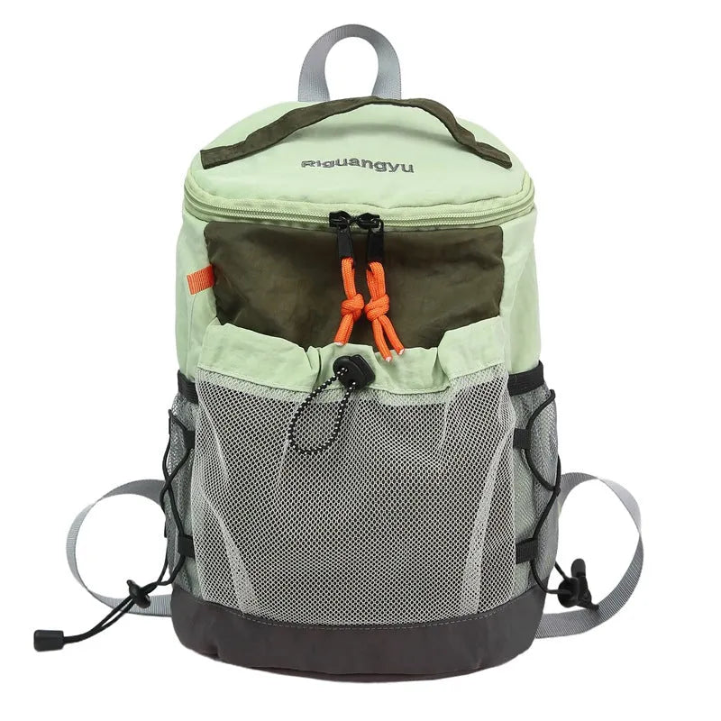 Japanese style lightweight nylon backpack in blue, curved shoulder straps, solid colour design
