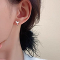 Women's fashion fishtail earrings in white gold and yellow gold colour options