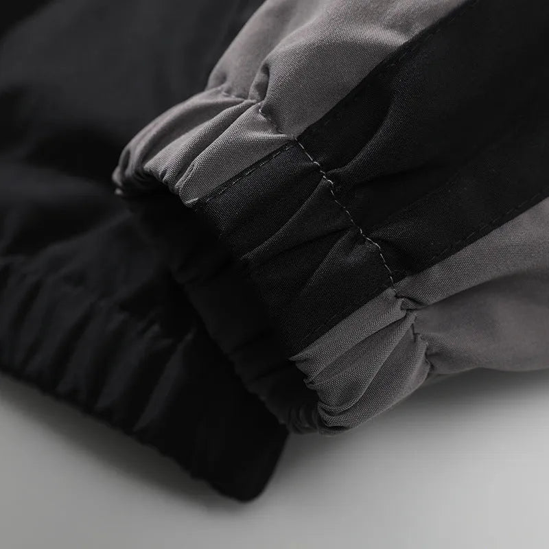 Men's black casual jacket with contrast stitching details and side seam pockets