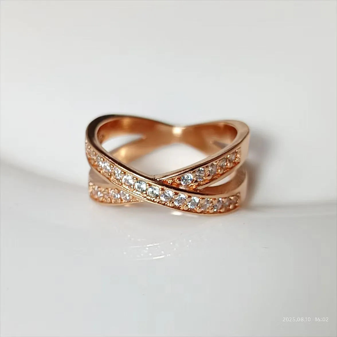 Metal cross ring with micro-inlaid zircon stones in silver and rose gold options