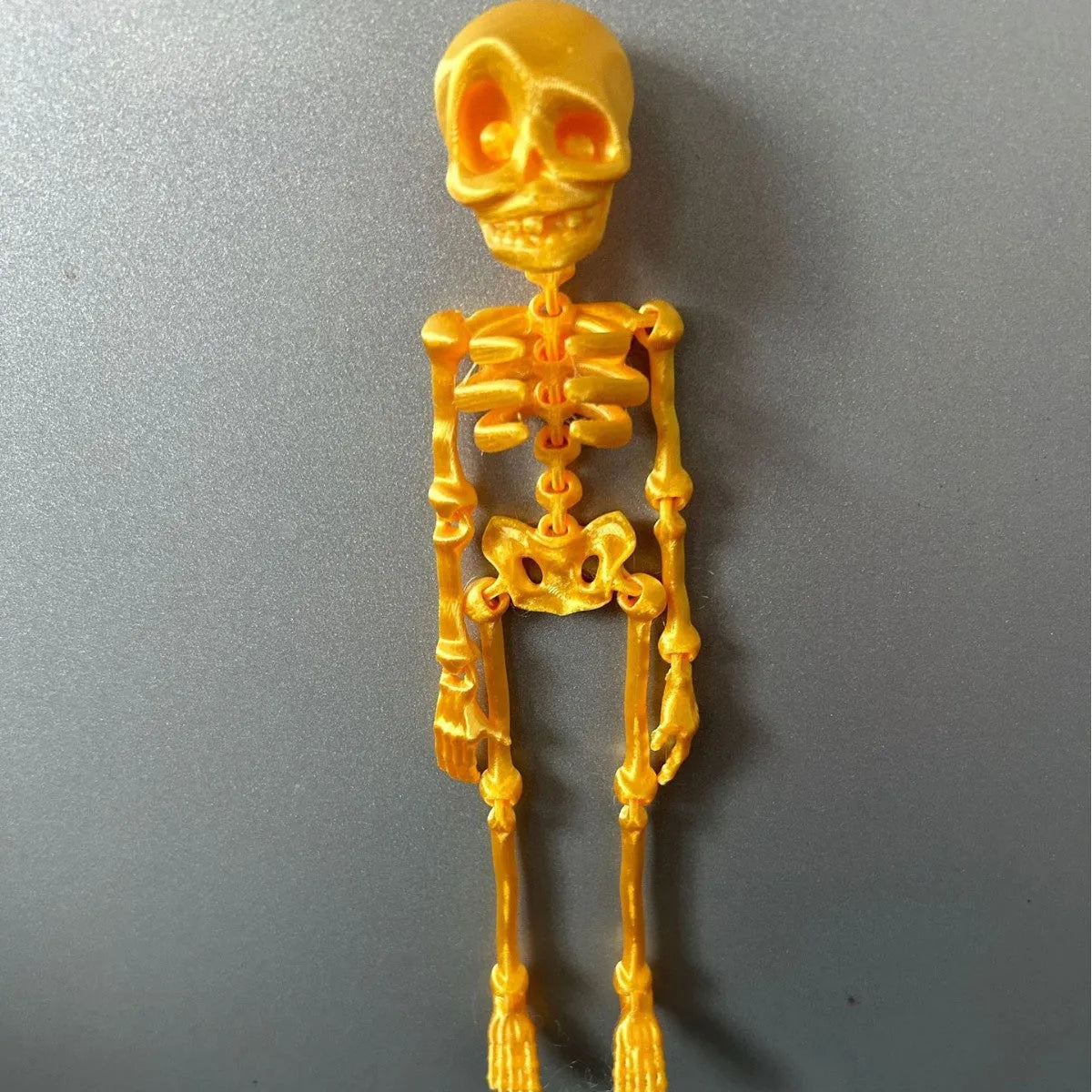 3D printed PLA skull refrigerator magnet ornament in multiple colour options measuring 18cm high