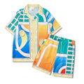 Plaid printed beach outfit set for men and women, featuring a short sleeve shirt and matching trousers.
