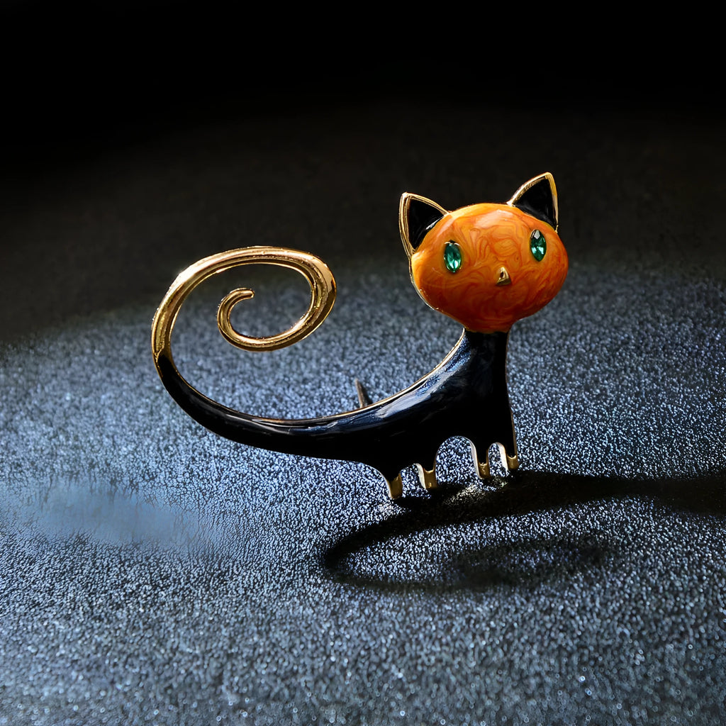 Personalised painted cat brooch in alloy metal showing white and orange colour options