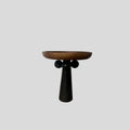 Nordic style wooden tray with four raised legs holding candles and aromatherapy bottles
