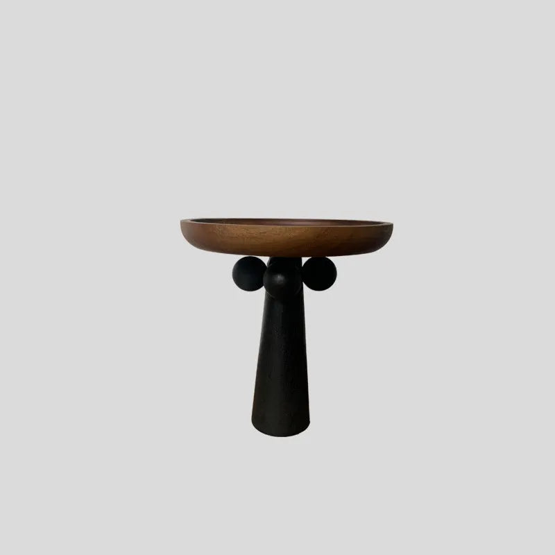 Nordic style wooden tray with four raised legs holding candles and aromatherapy bottles