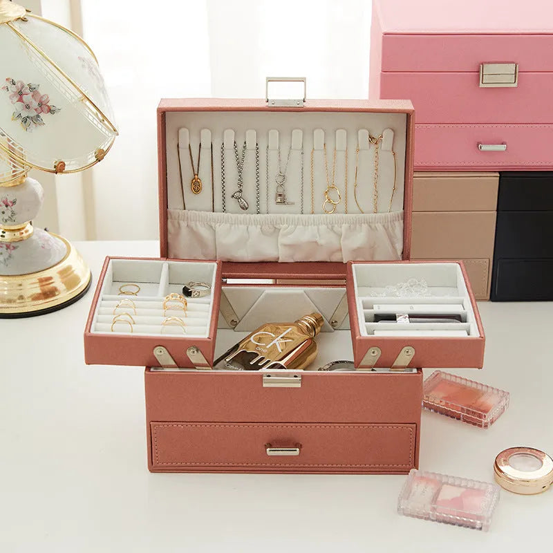 Hard PU leather jewellery storage box with velvet-lined interior compartments in beige colour.