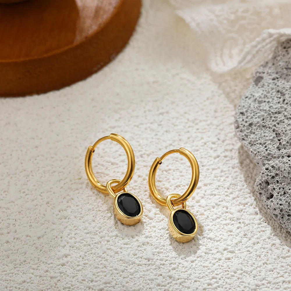 Women's copper oval zircon earrings in retro style, showing colour options including emerald and army green.