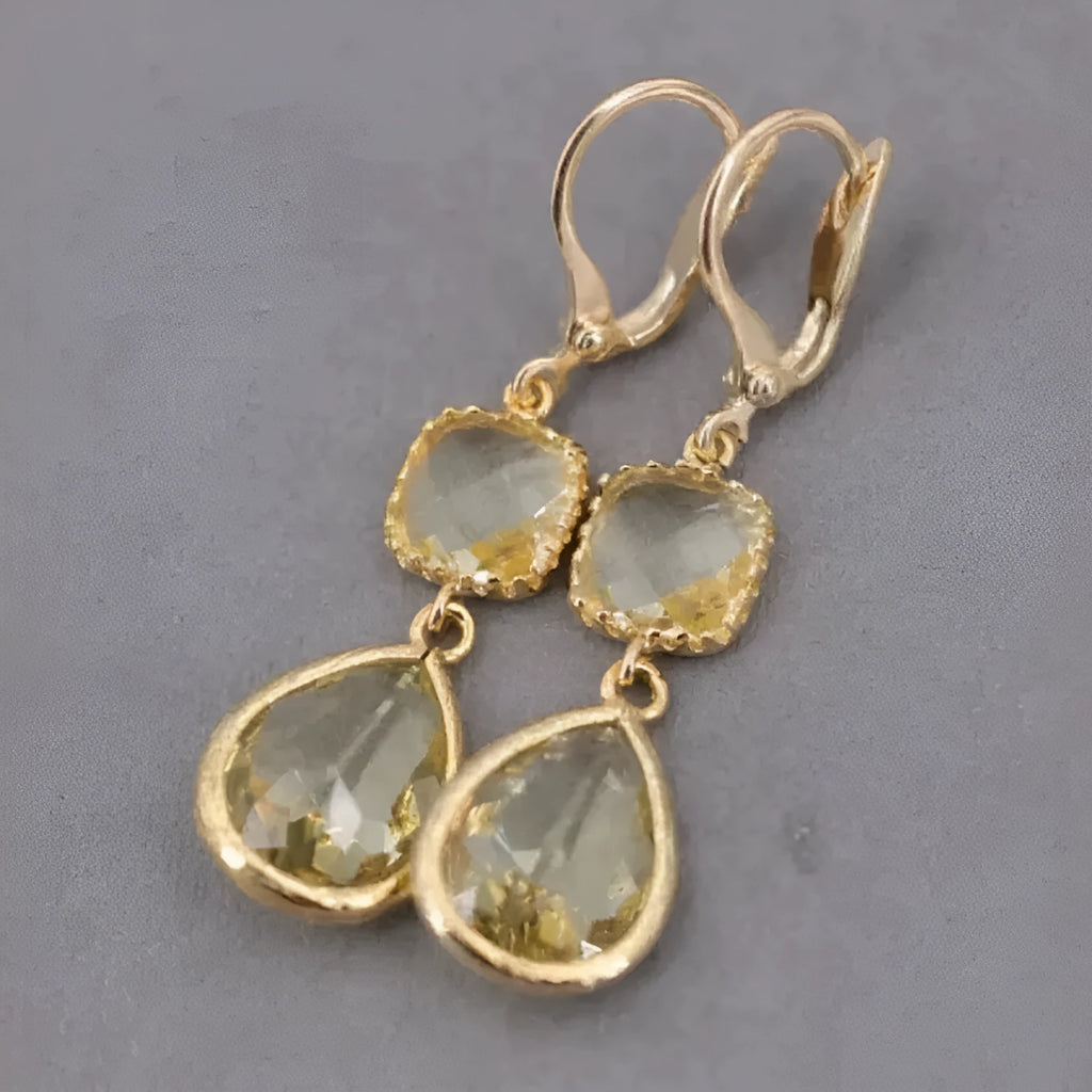 Gold geometric fringe earrings with crystal water droplets on copper frame
